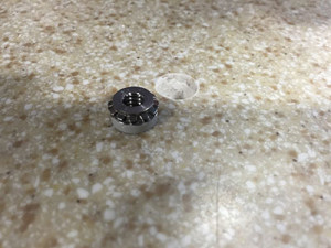 This is a keep nut fastener next to prepared hole.